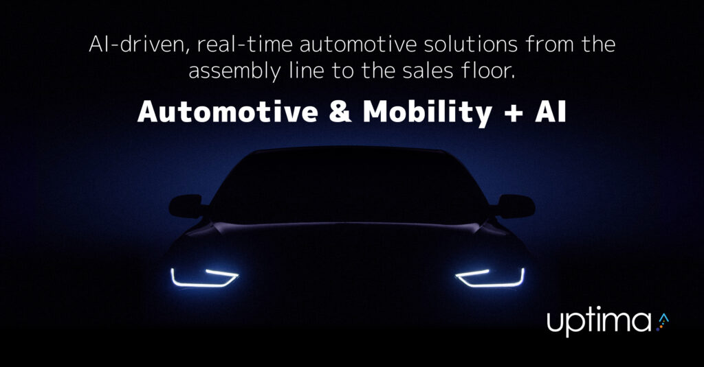 Text stating "AI-driven, real-time automotive solutions from the assembly line to the sales floor. Automotive & Mobility+ AI" over image of high performance car illuminated by LED headlights and ambient indigo lighting over black background